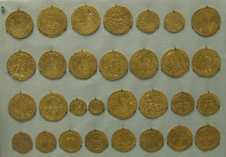 Rows of historic gold coins displayed for comparison